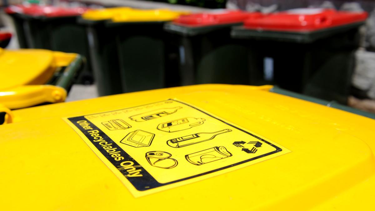 Residents outraged as rubbish collectors combine recycling and waste in Sydney streets